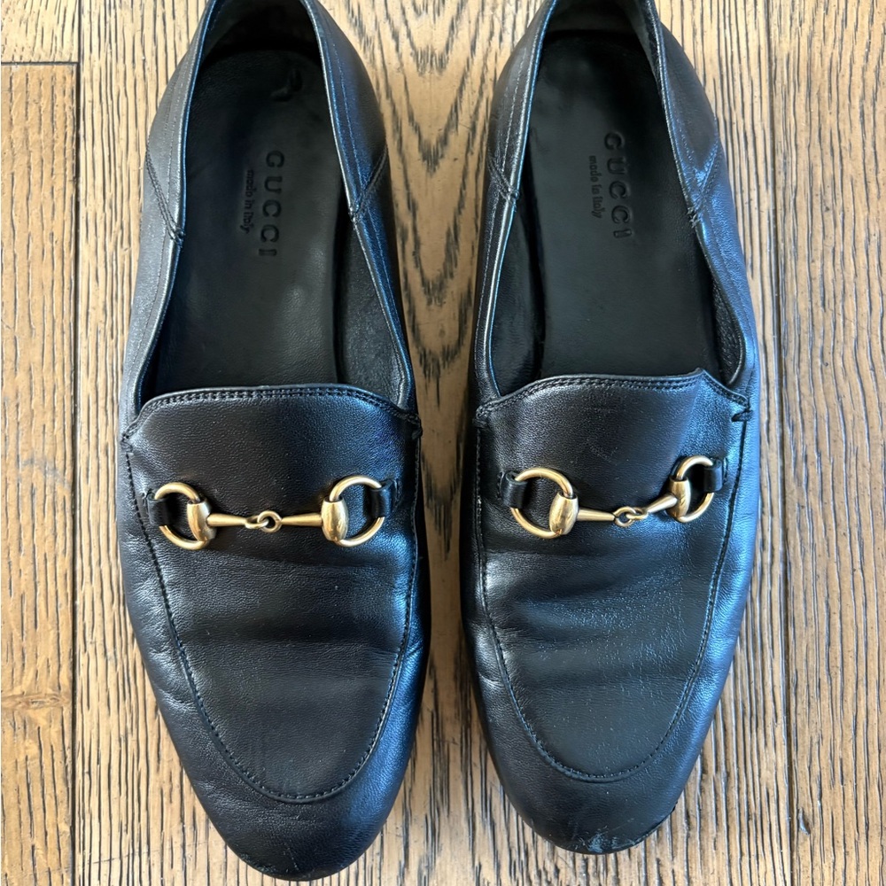Gucci Black Leather Loafers with Gold Accent